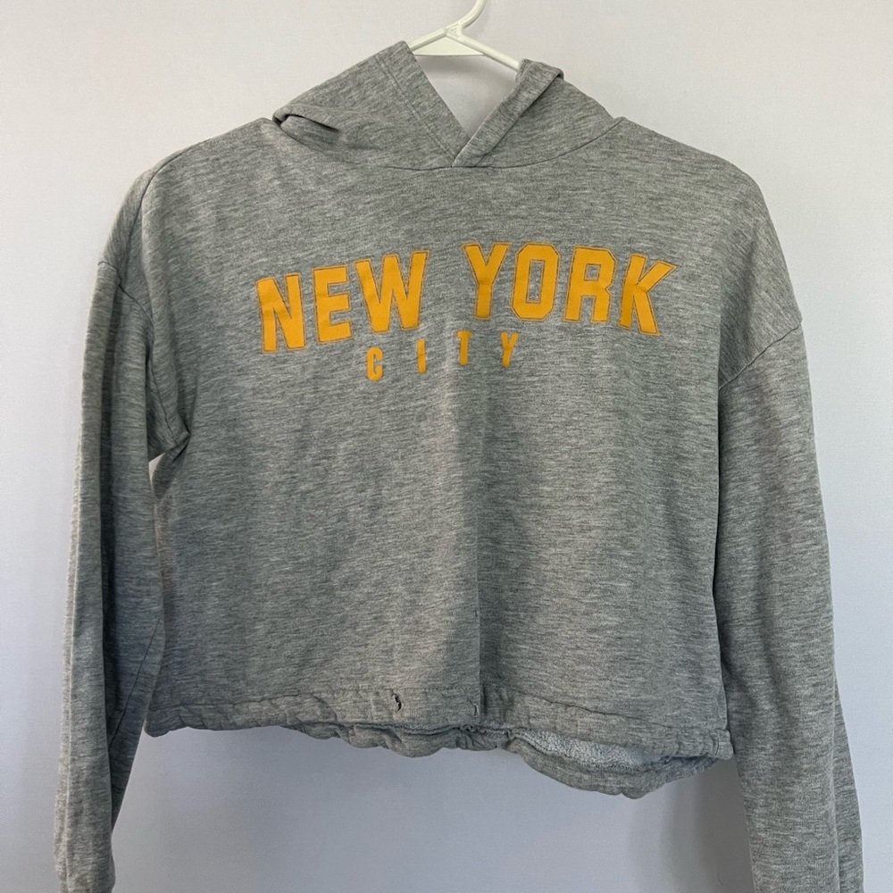 Gently used girls New York crop top from H&M
